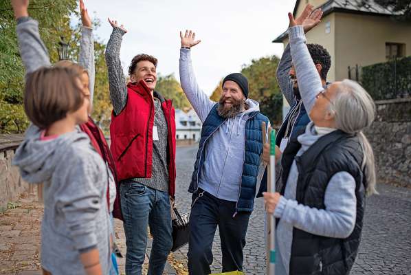 media/k2/galleries/19569/thumbs/diverse-group-happy-community-service-volunteers-raising-hands-together-outdoors-street_web.jpg