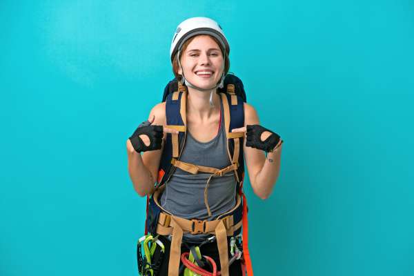 media/k2/galleries/20707/thumbs/young-english-rock-climber-woman-isolated-blue-background-proud-selfsatisfied_web.jpg