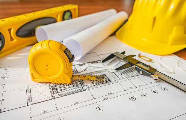 media/k2/galleries/23834/thumbs/construction-plans-with-yellow-helmet-drawing-tools-bluep_web.jpg