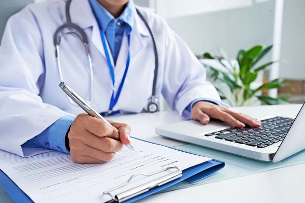 media/k2/galleries/23838/thumbs/hands-unrecognizable-female-doctor-writing-form-typing-laptop-keyboard_web.jpg