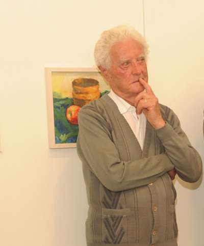 L&rsquo;artist Lois Irsara de Jan, nasci&uuml; dan 100 agn.
