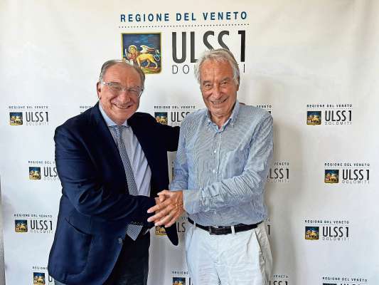 Da mán ciámpa: l Comisar General de la Uls 1 Dolomiti Giuseppe Dal Ben e l prescident de Confcommercio Paolo Doglioni.
