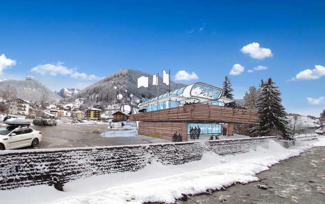 L render de la stazion de partenza jun Navalge del nef impiant portamont Moena-Valbona.
