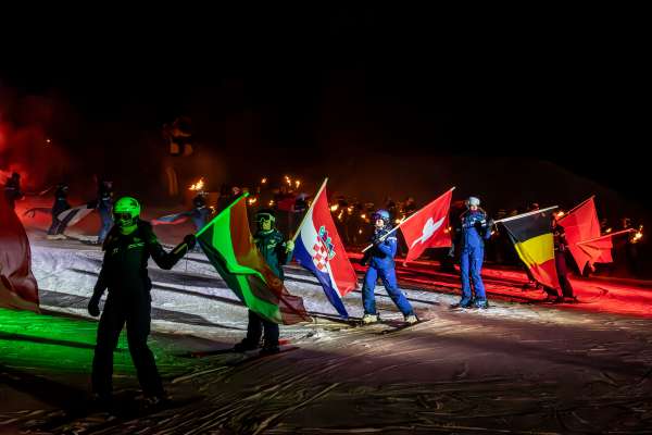 Le spetacul sön i schi é sot al sëgn dles Olimpiades 2026